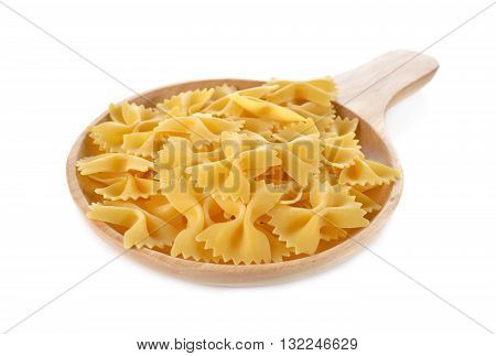 Farfalle (Bow Ties) pasta in wooden plate on white background