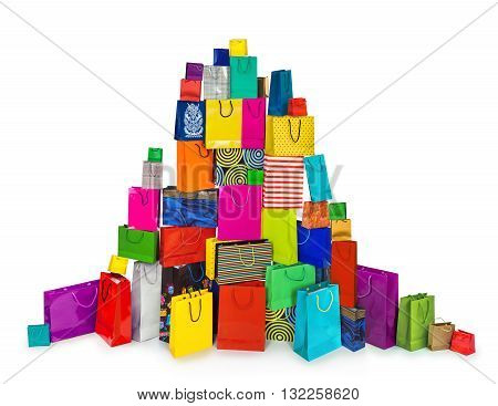 a huge pile of multi-colored bags for shopping isolated on white background