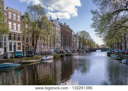 View of Amsterdam canal with historic houses Netherlands