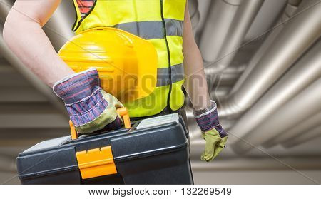 Maintenance Concept. Technician And Pipes In Background.