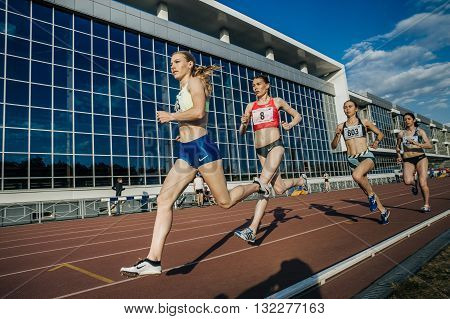 Chelyabinsk Russia - May 24 2016: group of girls leaders stayers running a distance of 1500 meters during UrFO Championship in athletics