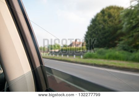 View from the window of a car for a motion blur on the road