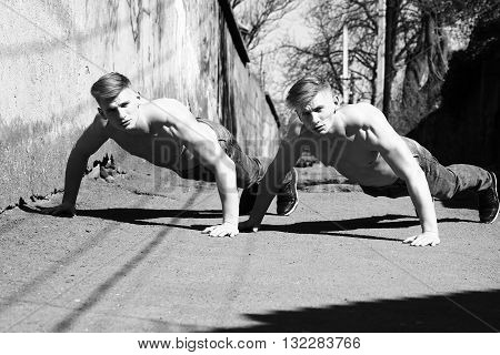 Twin Brothers Do Push-ups