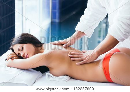 Woman And Massage Therapist