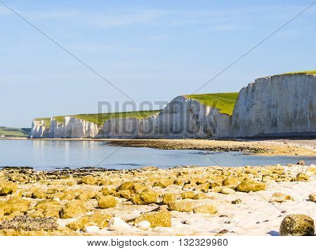 Seven Sisters National Park view of the cliffs and the beach on a low tide. East Sussex, England