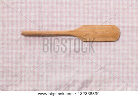 Small paddle for cooking sweet tablecloth background