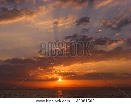 Sunset at the mountain from the sea in Hurghada
