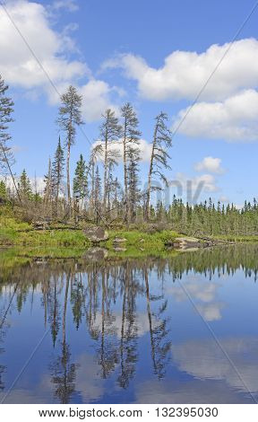 Reflections on a Cross Bay Lake in the Boundary Waters in Minnesota