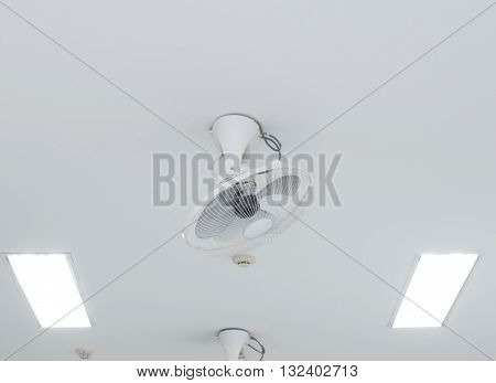 a Ceiling Fan on white office ceiling