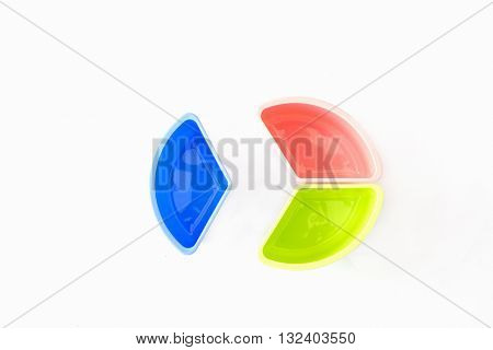 Multi-coloured disposable plastic isolated on white background