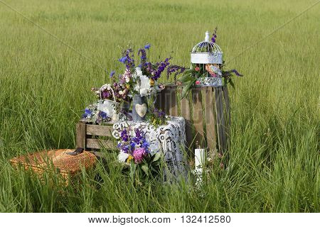 Wedding decorations in rustic style. Decorative scenery in summer
