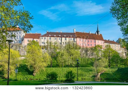 Park and pond close to wall of old town. Tallinn Estonia Baltic States