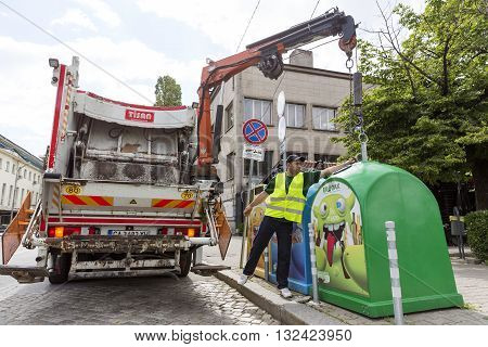 Recycling Truck Picking Up Trash Bins
