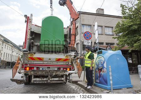Recycling Truck Picking Up Trash Bins