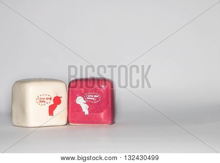 valentines day composition with dual love cube stones