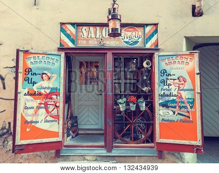 Tallinn Estonia - May 31 2016: Beauty salon in pin-up style on Vaimu street in the Historical Centre of Tallinn city. Tallin Estonia.