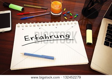 Erfahrung - german word for experience - handwritten text in a notebook on a desk - 3d render illustration.