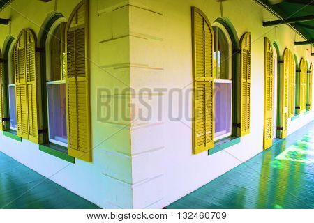 May 16, 2016 in Key West, FL:  Refurbished large windows and window shutters taken from a balcony at the Hemmingway House which was the home of author Ernest Hemmingway and is now a museum where tourists can take tours in Key West, FL