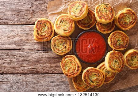 Sliced Potato Rolls With Tomato Sauce Close Up. Horizontal Top View