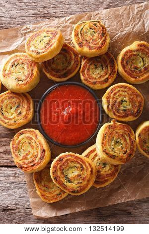 Sliced Potato Rolls With Tomato Sauce Close Up. Vertical Top View