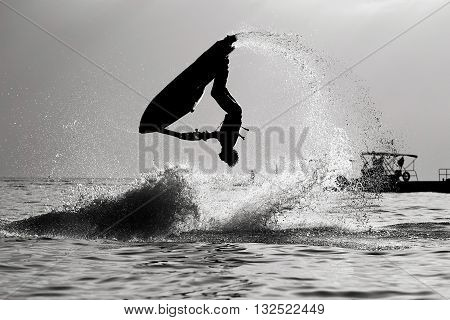 Silhouette picture, Jetski Freestyle back and white.