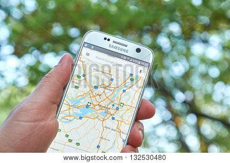 MONTREAL CANADA - MAY 23 2016 : Google Maps application on Samsung S7 screen. The Google Maps app is a popular gps navigation software.