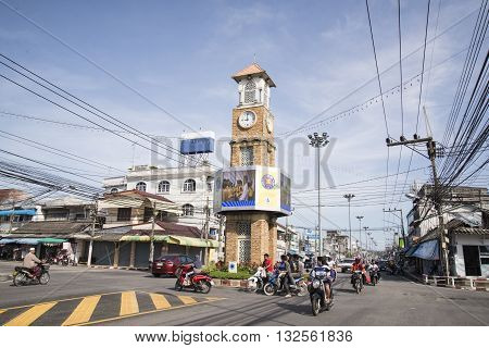 BETONG THAILAND - DECEMBER 10: The clock tower of Betong Thailand with the usual traffic in Betong Thailand on December 10 2015
