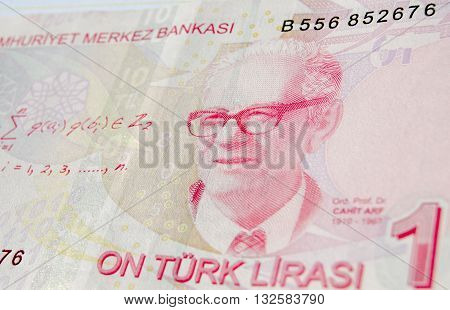 Famous mathematician Professor Dr Cahit Arf on a ten Lira banknote in circulation in Turkey. He is famous for work leading to knot theory and surgery theory. Used banknote photographed at an angle.