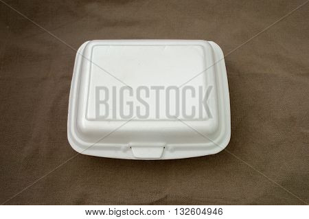 Foam boxes rice package on brown cloth