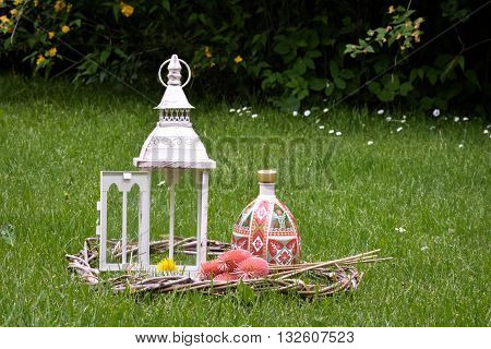 lantern on grass in vintage style. Garden decor
