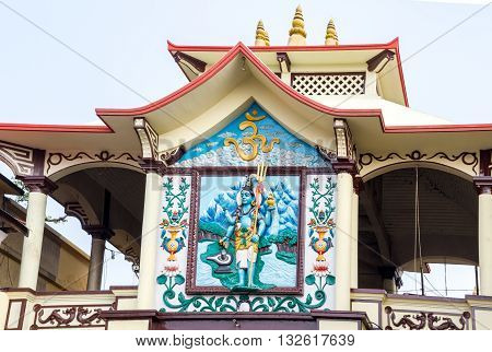 KathmanduNepal- Mar 22016 : The Lord Shiva of Pashupatinath Temple with the Trident and Basuki Nagh at the main entrance of the Temple.