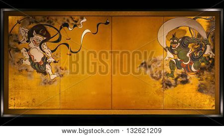 KYOTO JAPAN - NOVEMBER 22 2015: Ancient paintings of Wind and Thunder Gods on partitions at Kenninji Temple