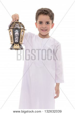 Happy Boy With Lantern In White Djellaba Celebrating Ramadan