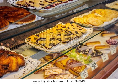 AIX-EN-PROVENCE FRANCE - JUL 17 2014: French traditional bakery pastry store in the center of AIX with diverse cakes and eclairs