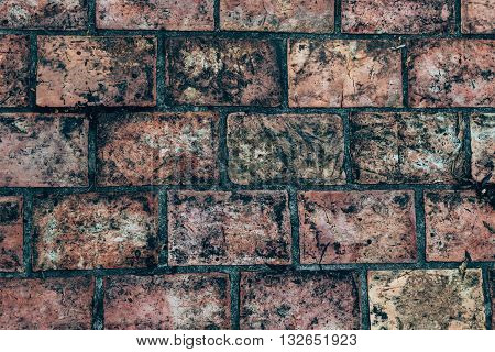 Dirty Antique floor bricks in the Songkhla park, Thailand