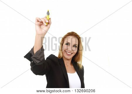business portrait of attractive blond successful businesswoman holding marker writing or pointing to transparent glassboard screen isolated in white smiling happy and confident with copy space