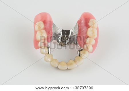 Clasp Prosthesis With And Latch Ceramic Crowns