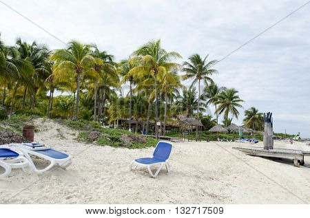 Empty beach chairs waiting for tourists in Cayo Guillermo - Ciego de Avila Province, Cuba.