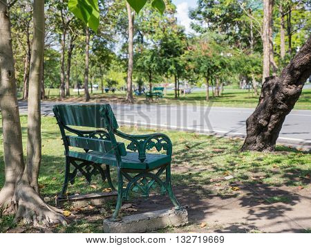 Empt woodeny chair in public park Bangkok