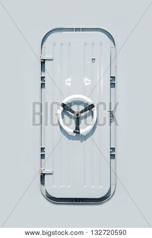 Battle ship and Marine door on gray background