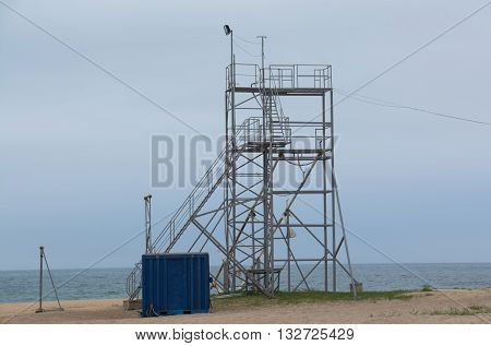 Metal tower of the coast guard on the beach
