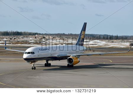 HELSINKI FINLAND - MAR 17: Icelandair Boeing 757-200 in Helsinki International Airport on March 17 2016 in Helsinki Finland. Icelandair is the main airline of Iceland.