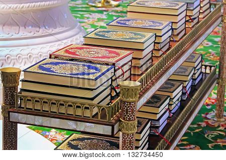 Quran in the mosque lies on the shelves stacks of the book of the Muslim religion Islamic books for sale Arabic Religion