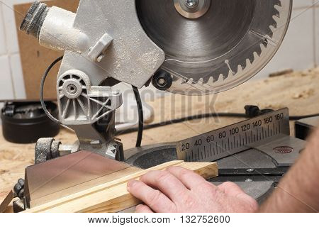 Carpenter tools on wooden table with sawdust. Carpenter workplace top view.
