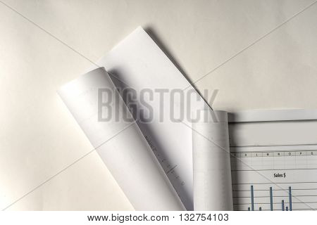 Workplace of architect - Architect rolls and plans.architectural plantechnical project drawing. Engineering tools view from the top. Construction background.