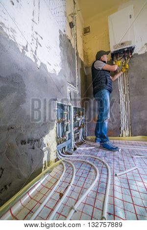 pipefitter installing system of heating