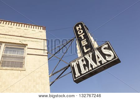 FORT WORTH USA - APR 6: Hotel Texas sign in the Fort Worth Stockyards historic district. April 6 2016 in Fort Worth Texas USA