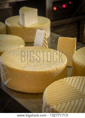 Large chunks of goat cheese on sale in a farm shop in Fuerteventura, Canary Islands, Spain
