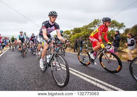 MELBOURNE, AUSTRALIA - FEBRUARY 1: The peloton passes the famous landmark of Bells Beach in the inaugral Cadel Evans Great Ocean Road Race