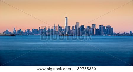 Panoramic Sunset of Lower Manhattan and New York City Harbor with Financial District skyscraper